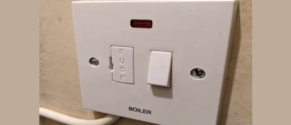 boiler at the fuse switch or fuse spur